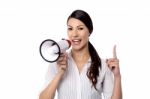 Happy Woman Posing With Megaphone Stock Photo