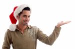 Young Male Wearing Christmas Hat Stock Photo