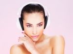 Woman With Headphones Stock Photo