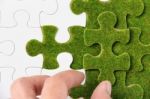 Green Puzzle Piece Stock Photo