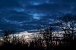 Bright Cloudy Sky At Sunset Stock Photo