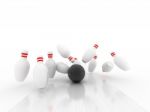 Bowling Ball Crashing Into Pins Stock Photo