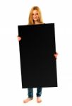 Pretty Young Woman Holding A Black Banner Stock Photo