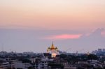 Twilight Time : The Golden Mount At Wat Sraket Rajavaravihara Te Stock Photo