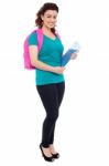 Student With Backpack And Notebook Stock Photo