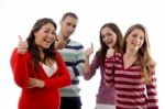 A Group Of Smiling People With Thumbs Up Stock Photo