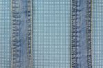 Jeans With Stitch On Blue Dot Cloth Stock Photo