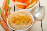 Fresh Hummus Dip With Raw Carrot And Celery Stock Photo