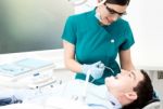 Professional Dentist Doing Dental Checkup Stock Photo