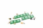 Miniature Worker Team Building Word Happy New Year On White Back Stock Photo