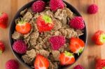 Bran Flakes With Fresh Raspberries And Strawberries Stock Photo