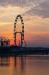 Ferris Wheel With Sunrise Stock Photo