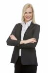 Businesswoman With Folded Arms Stock Photo