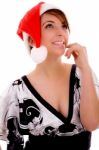 Front View Of Cheerful Woman In Christmas Hat Stock Photo