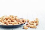 Cashew Nut On Tablecloth Stock Photo