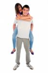 Teenage Boy Piggybacking Girl Stock Photo