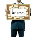 Male Holding Internet Board Stock Photo