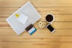 Top View Blank Paper Note On Notebook Of Laptop With Things, Whi Stock Photo