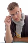 Young Male Holding Eyewear Stock Photo