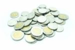 Group Of Thai Baht Coins On White Table Background Stock Photo