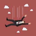 Businessman Falling Stock Photo