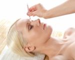 Spa Lady Having Eyebrows Plucked Stock Photo