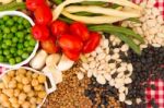 Variety Of Kitchen Ingredients With Fresh And Dried Legumes Stock Photo