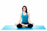 Young Woman Doing Yoga, Isolated On White Stock Photo