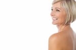 Smiling Nude Woman Looking Away Stock Photo