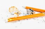 Broken Pencil With Metal Sharpener And Shavings Stock Photo