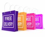 Free Delivery Shopping Bags Showing No Charge Or Gratis To Deliv Stock Photo