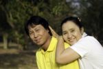 Portrait Of Happy Family In Park Stock Photo