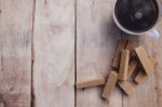 Cup Of Coffee And Wafers On The Wood Background Stock Photo