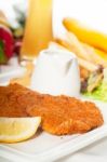 Classic Milanese Veal Cutlets And Vegetables Stock Photo