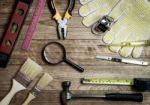 Set Of Tools Over A Wood Background Stock Photo