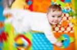 Infant Boy On Playmat Stock Photo