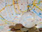 Miniature Traveller Or Backpacker Stand On Globe Of Glass, Euro Stock Photo