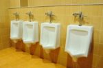 Urinals At Office Stock Photo