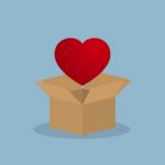 Red Heart Over Opened Box Stock Photo