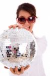 Front View Of Happy Woman Holding Disco Ball Stock Photo