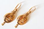 Two Golden Earrings Stock Photo