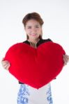 Asian Woman Holding A Red Heart Stock Photo