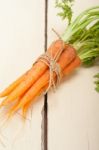 Baby Carrots Bunch Tied With Rope Stock Photo