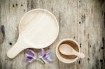 Wood Dish On The Wooden Background. Top View Stock Photo