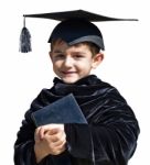 Cute Kid Graduate With Graduation Cap Stock Photo