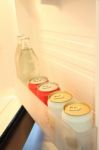 Some Beverage In Door Shelf Of Refrigerator Stock Photo