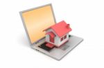 House Model On The Laptop Stock Photo