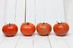 Red Tomatoes Fruits Isolated On White Stock Photo