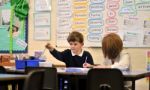 A Schoolboy And His Teacher Stock Photo