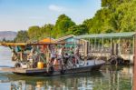 Ship Passenger And Motorbikes Across  Khwae Noi River At Kanchanaburi Thailand .december 2, 2018 Stock Photo